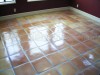 Mexican Saltillo paver tiles completely stripped to bare tile and sealed with medium shine sealer.