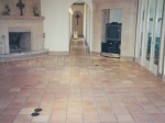 Mexican Saltillo paver tile with dull and worn sealer.