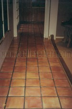 Mexican Saltillo paver tiles completely stripped to bare tile, acid washed and sealed with high gloss sealer / polish.